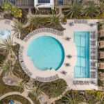 Three Sixty South Bay pool area drone shot